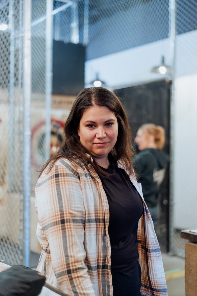An agent smiling between throws