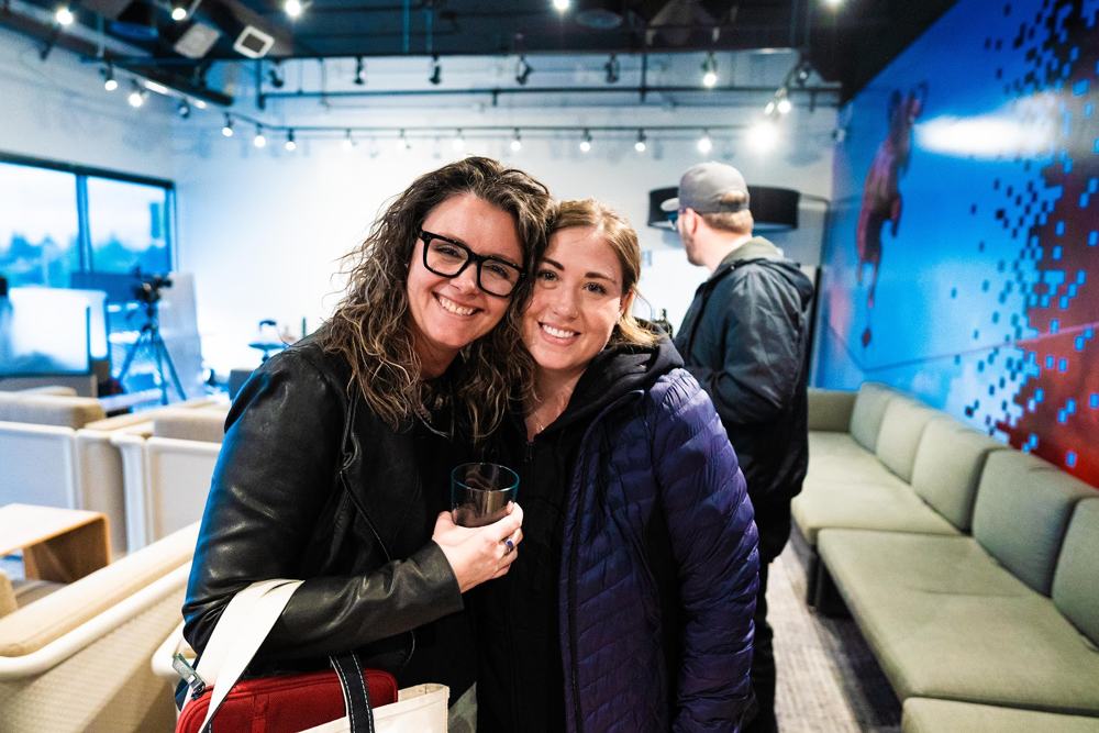 Two agents arm in arm at Redline HQ